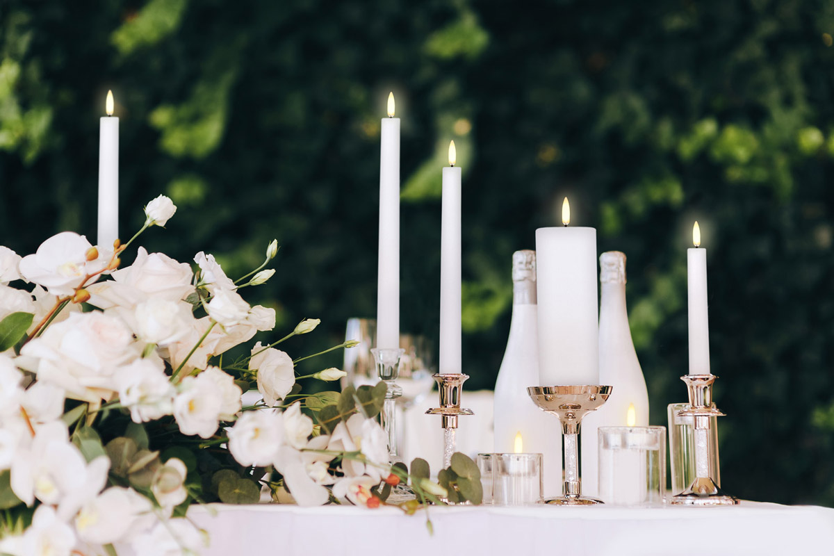 Elegant wedding with taper candles and pillars