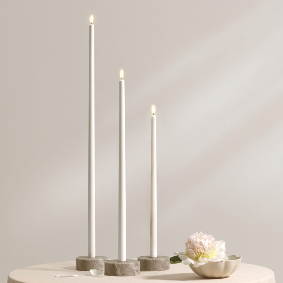 Uyuni Lighting Tall Taper Flameless Candles make a grand statement.