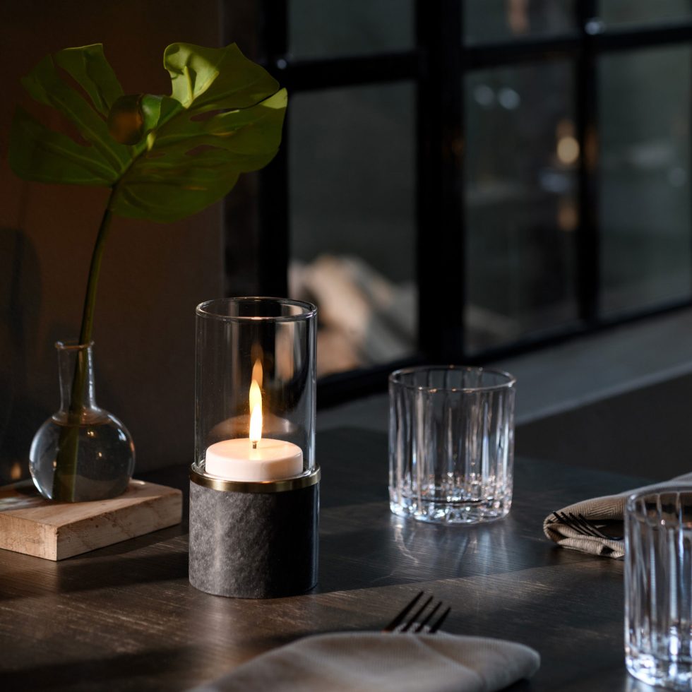 Restaurant table styling with Uyuni Lighting Maxi Tea Light, creating warm, inviting ambience for cafés, restaurants and hospitality venues.